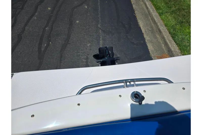 Slide: The Image of 2003 Tahoe Q5L boat stern view with motor mount on asphalt. - 26