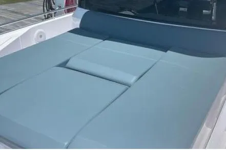 Slide: The Image of 2023 Axopar 37 XC CROSS CABIN with spacious sunbed on deck. - 19