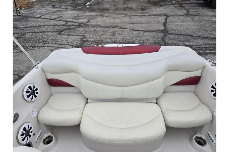 Slide: The Image of Luxurious seating on a 2011 Tahoe Q4 SS boat with white and red upholstery. - 35