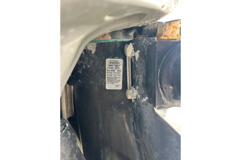 Slide: The Image of Close-up of a 2008 Donzi 38 ZFX Open engine label with specifications. - 12