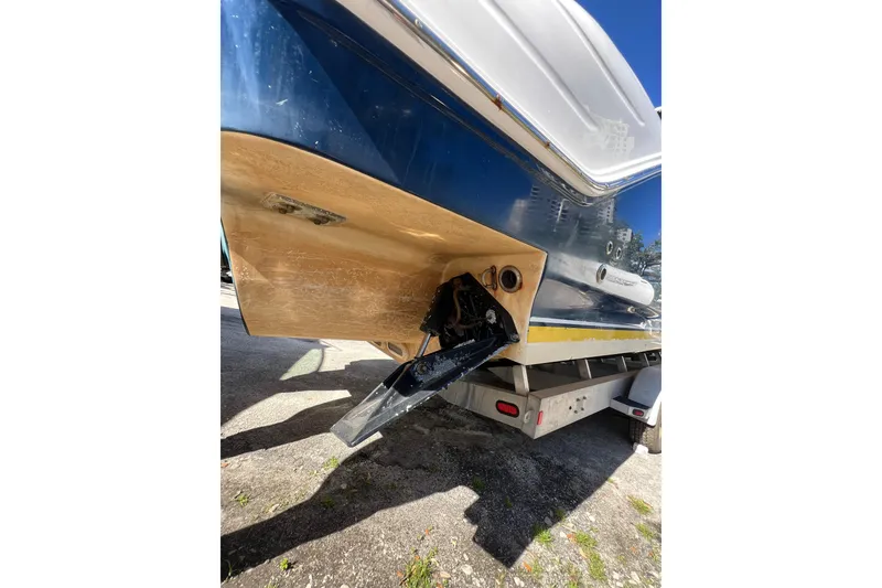 Slide: The Image of 2008 Donzi 38 ZFX Open boat on trailer, showing hull and outdrive. - 22
