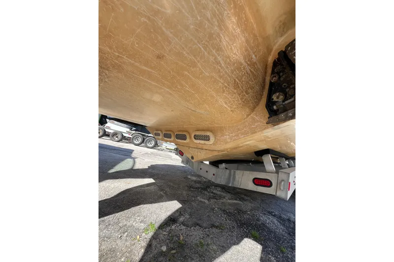 Slide: The Image of Underside view of a 2008 Donzi 38 ZFX Open boat on a trailer. - 23