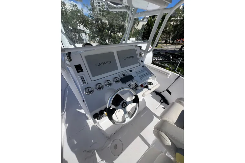 Slide: The Image of 2008 Donzi 38 ZFX Open boat cockpit with Garmin navigation system. - 36
