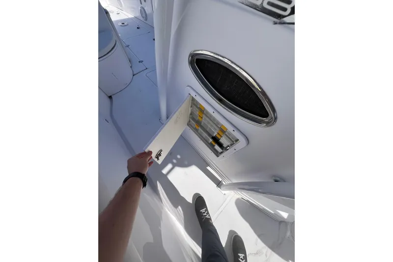 Slide: The Image of 2008 Donzi 38 ZFX Open boat interior with open storage compartment. - 44