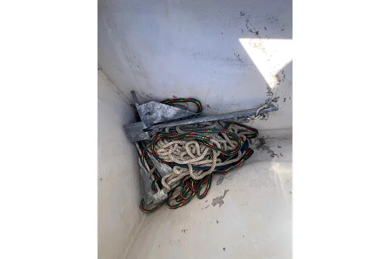 Slide: The Image of Anchor and ropes in a 2008 Donzi 38 ZFX Open boat compartment. - 6