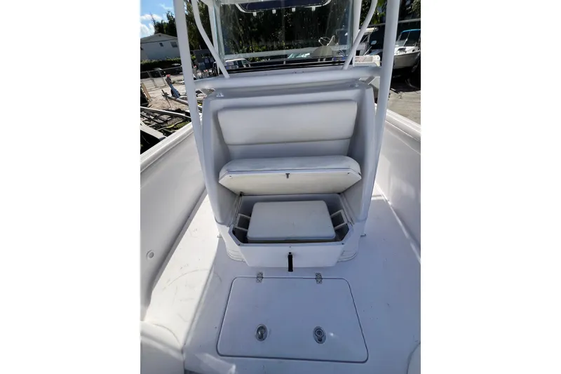 Slide: The Image of 2008 Donzi 38 ZFX Open boat interior with white seating and storage compartments. - 8