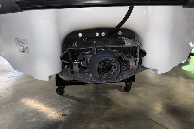 Slide: The Image of 2004 Yamaha WaveRunner FX jet ski underside showing propulsion system on a stand. - 9