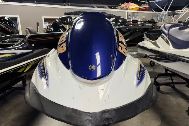 Slide: The Image of 2004 Yamaha WaveRunner FX in showroom, blue and white design. - 2