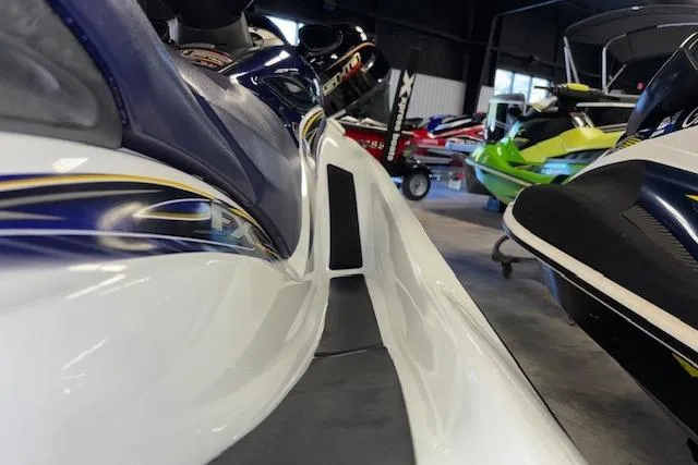 Slide: The Image of 2004 Yamaha WaveRunner FX in showroom, close-up side view. - 9
