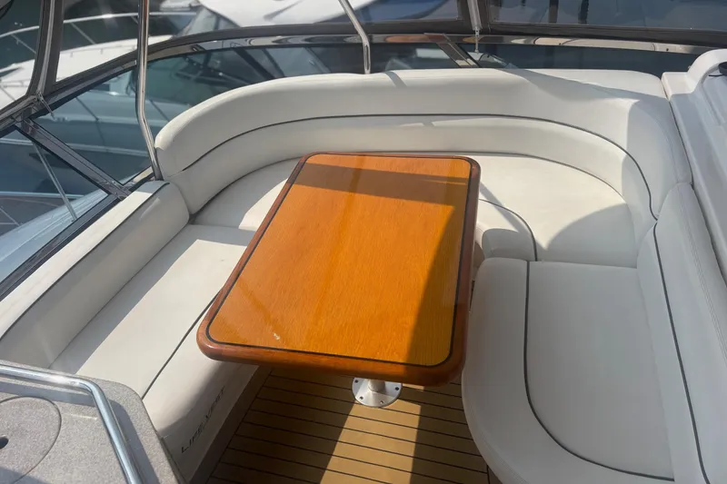 Slide: The Image of Luxurious seating area on a 2006 Sea Ray 52 Sedan Bridge yacht. - 10