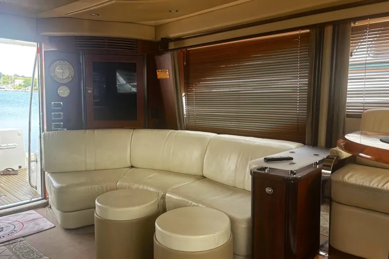 Slide: The Image of Luxurious interior of 2006 Sea Ray 52 Sedan Bridge yacht with leather seating. - 25