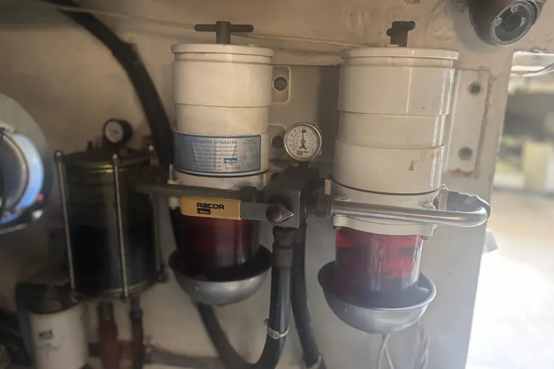 Slide: The Image of Fuel filter system in a 2006 Sea Ray 52 Sedan Bridge yacht engine room. - 44