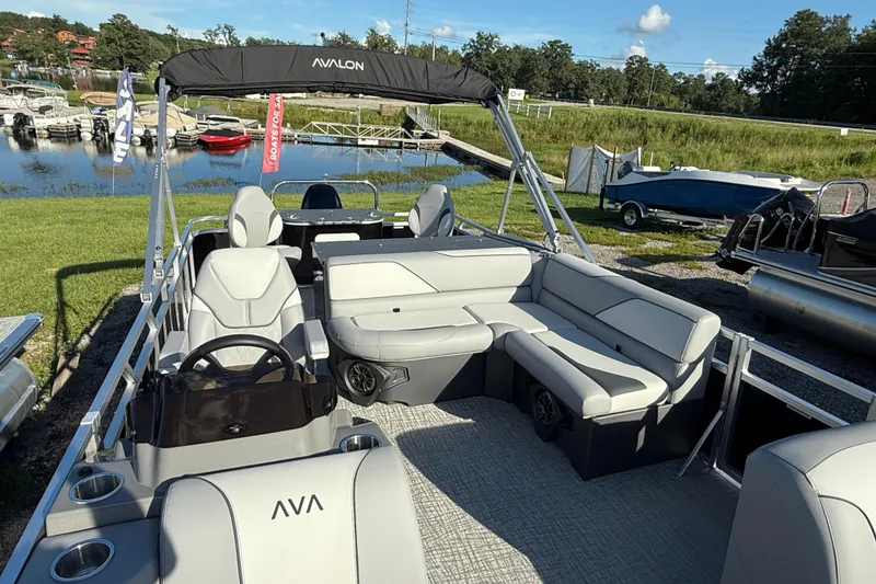Slide: The Image of 2026 Avalon Venture 85 Rear Fish pontoon boat with sleek seating and modern design. - 3
