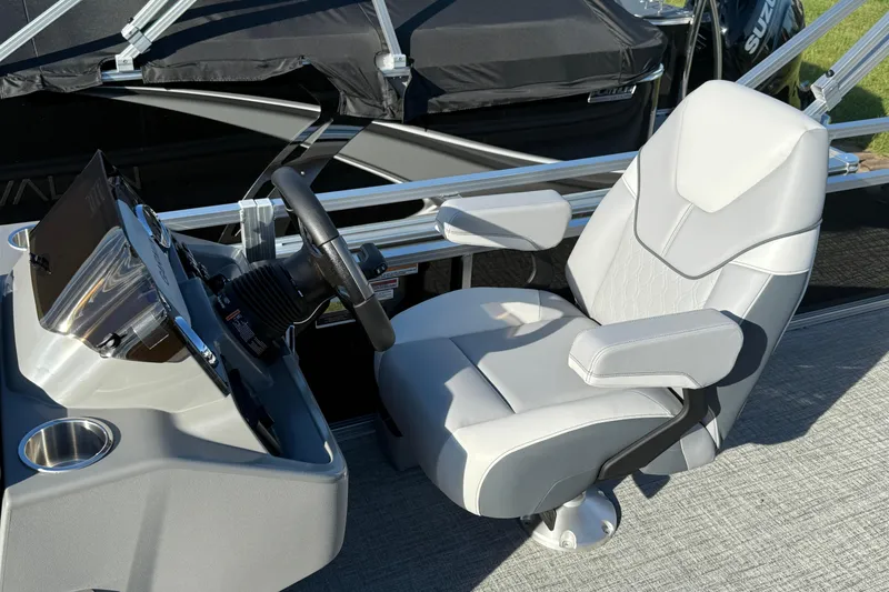 Slide: The Image of Captain's chair and helm of 2026 Avalon Venture 85 Rear Fish boat. - 8
