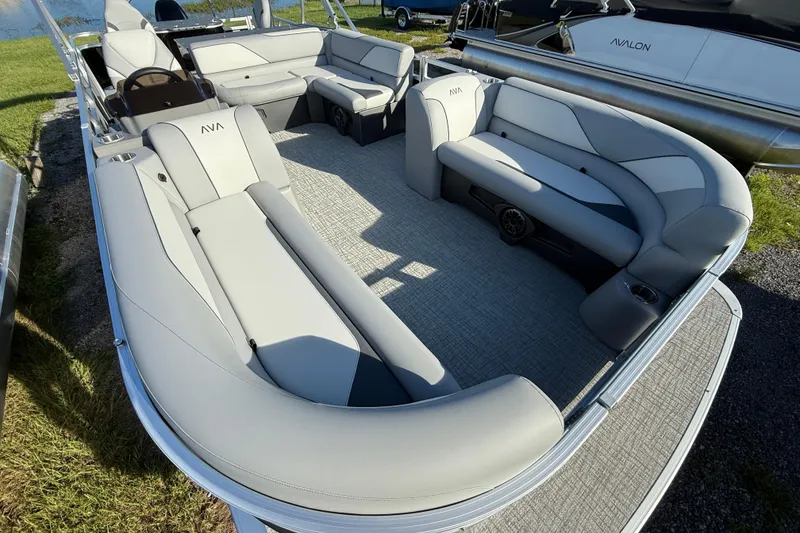 Slide: The Image of 2026 Avalon Venture 85 Rear Fish pontoon boat with spacious seating and modern design. - 9