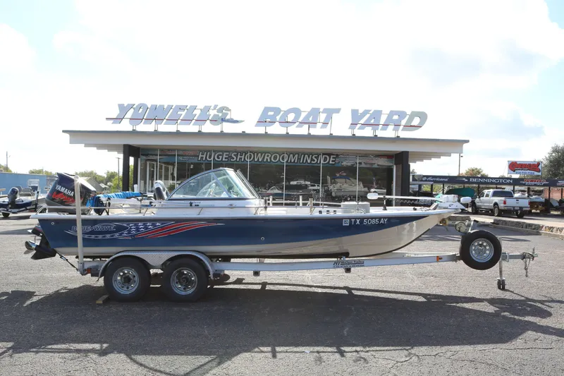The Image of 2008 Blue Wave 220 Deluxe Pro boat on trailer at Yowell's Boat Yard. - 0