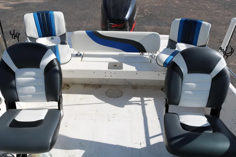 Slide: The Image of 2008 Blue Wave 220 Deluxe Pro boat interior with stylish seating arrangement. - 11