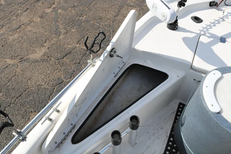 Slide: The Image of Open storage compartment on 2008 Blue Wave 220 Deluxe Pro boat deck. - 19