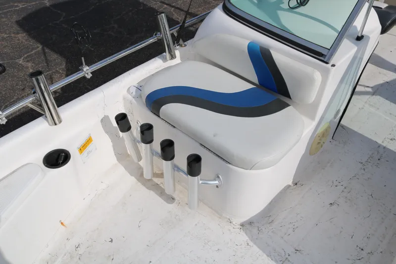 Slide: The Image of 2008 Blue Wave 220 Deluxe Pro boat seat with rod holders and sleek design. - 26