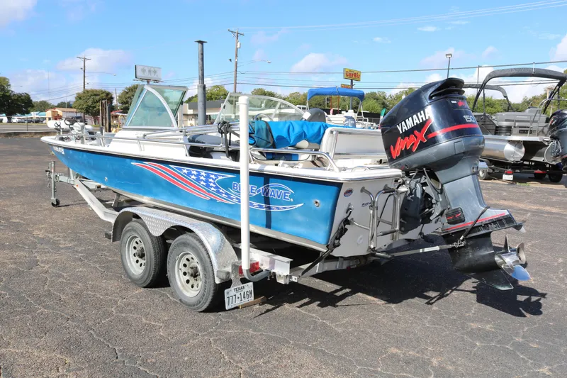 Slide: The Image of 2008 Blue Wave 220 Deluxe Pro boat with Yamaha VMAX engine on trailer. - 4