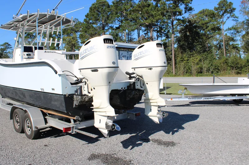 Slide: The Image of 2020 AMERICAT 27cc boat with dual Suzuki 200 engines on a trailer. - 4