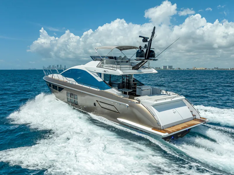 Slide: The Image of 2018 Azimut S7 luxury yacht cruising on open sea under sunny skies. - 3