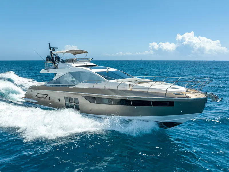 Slide: The Image of 2018 Azimut S7 luxury yacht cruising on open sea. - 7