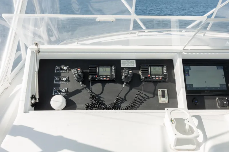Slide: The Image of Control panel of a 2000 Hatteras 50 Convertible yacht with navigation equipment. - 11
