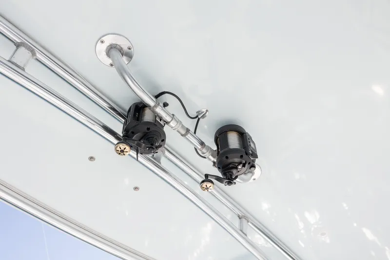 Slide: The Image of Fishing reels mounted on a 2000 Hatteras 50 Convertible yacht's ceiling. - 17