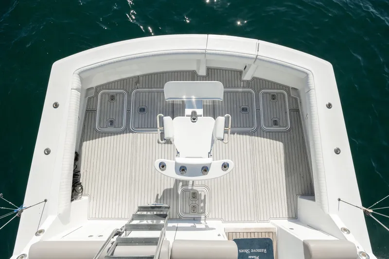 Slide: The Image of Aerial view of 2000 Hatteras 50 Convertible yacht deck with fishing chair. - 18