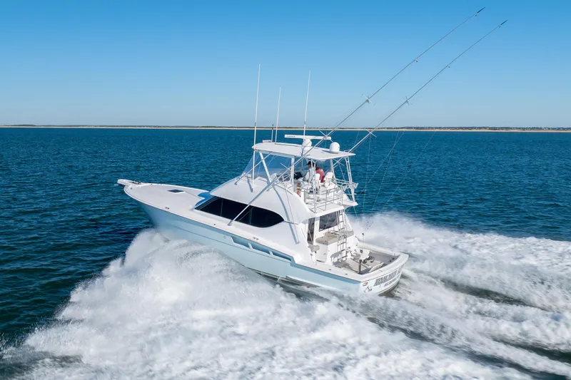 Slide: The Image of Hatteras 50 Convertible yacht cruising on open water, 2000 model. - 82