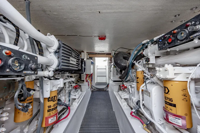 Slide: The Image of Engine room of 2000 Hatteras 50 Convertible yacht with Caterpillar marine engines. - 41