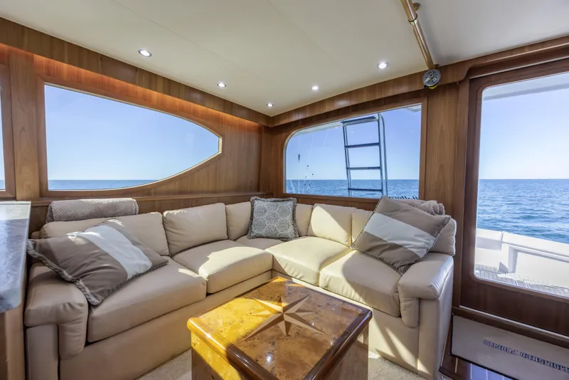 Slide: The Image of Luxurious interior of 2000 Hatteras 50 Convertible yacht with ocean view. - 50