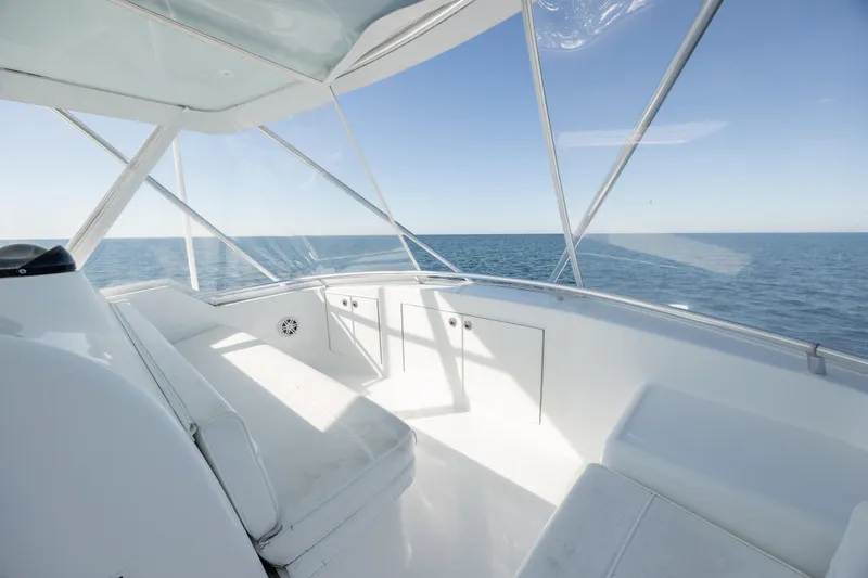 Slide: The Image of Interior view of 2000 Hatteras 50 Convertible yacht with ocean backdrop. - 15