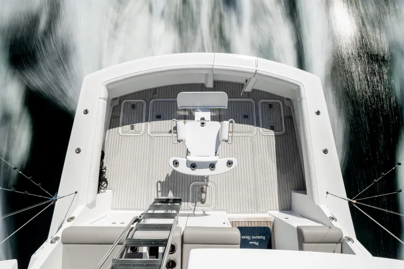 Slide: The Image of Overhead view of 2000 Hatteras 50 Convertible yacht's deck in motion. - 90
