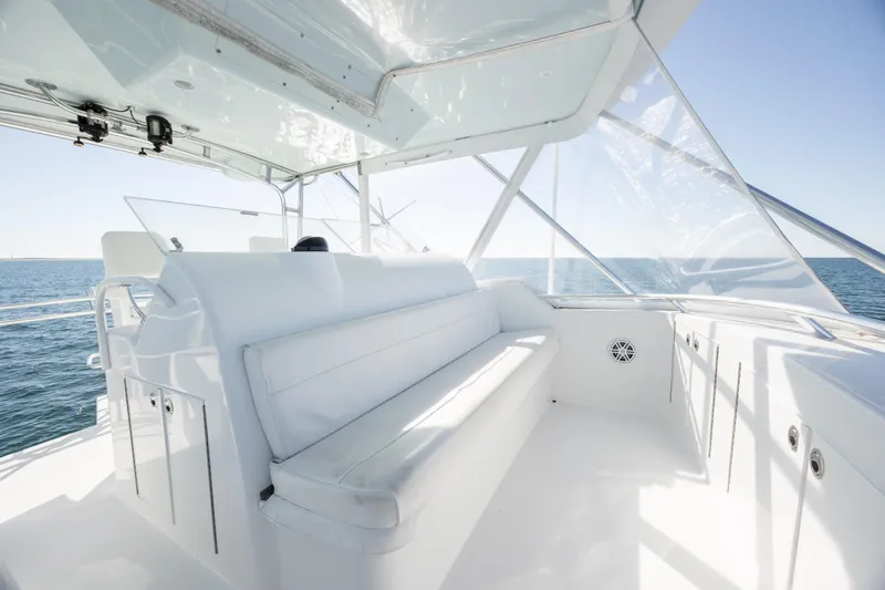 Slide: The Image of Luxurious interior of 2000 Hatteras 50 Convertible yacht with ocean view. - 16