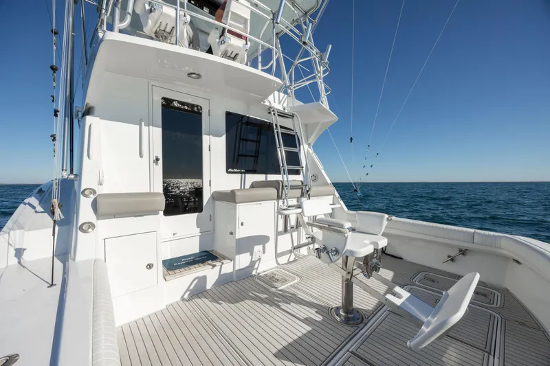 Slide: The Image of Hatteras 50 Convertible 2000 yacht deck with fishing chair and ocean view. - 20