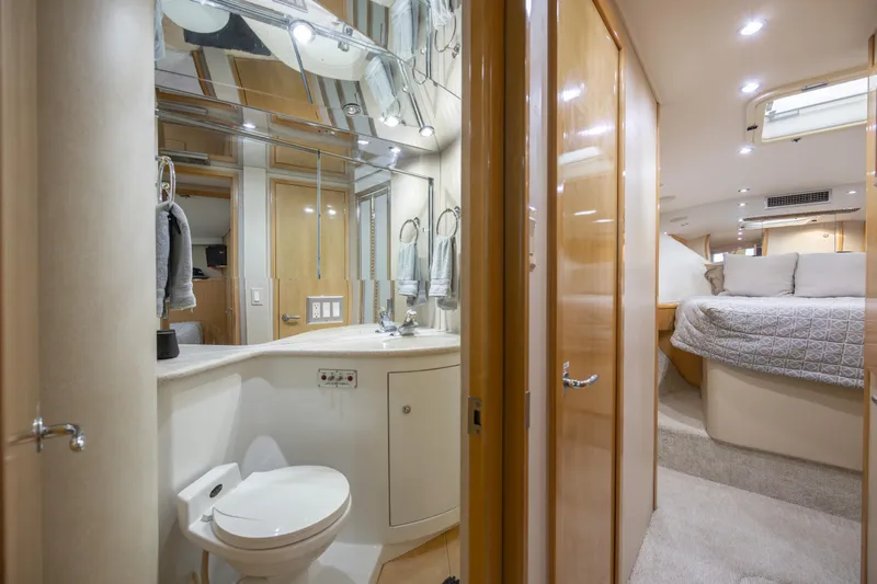 Slide: The Image of Luxurious bathroom and bedroom interior of 2000 Hatteras 50 Convertible yacht. - 67