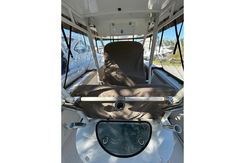 Slide: The Image of 2015 Pursuit C 280 Center Console boat dashboard with Garmin navigation system. - 2