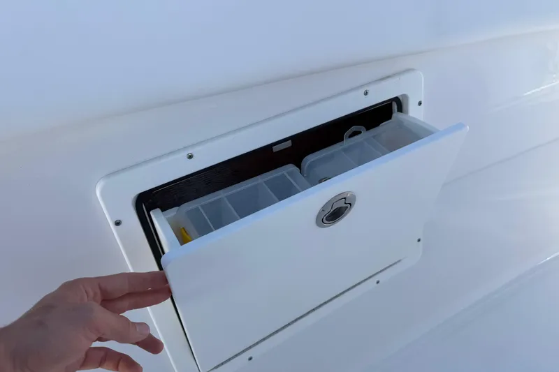 Slide: The Image of Storage compartment on 2024 Sportsman Open 282TE Center Console boat. - 30