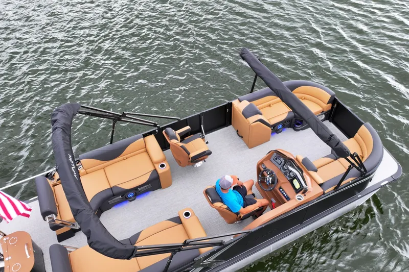 Slide: The Image of 2026 Avalon LSZ Quad Lounger Shift pontoon boat on water, featuring luxurious seating and modern design. - 5