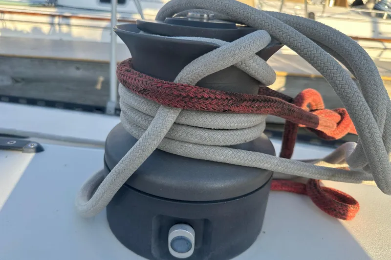 Slide: The Image of Winch with ropes on a 1984 C&C 41 sailboat deck. - 11