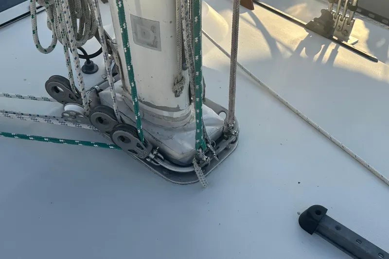 Slide: The Image of Deck of 1984 C&C 41 sailboat with rigging and pulleys. - 24