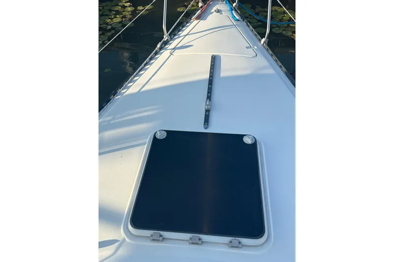 Slide: The Image of Deck of 1984 C&C 41 sailboat with hatch and rigging details. - 26