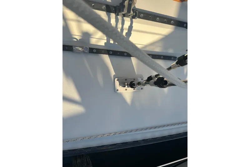 Slide: The Image of Close-up of rigging on a 1984 C&C 41 sailboat, showing detailed hardware. - 32