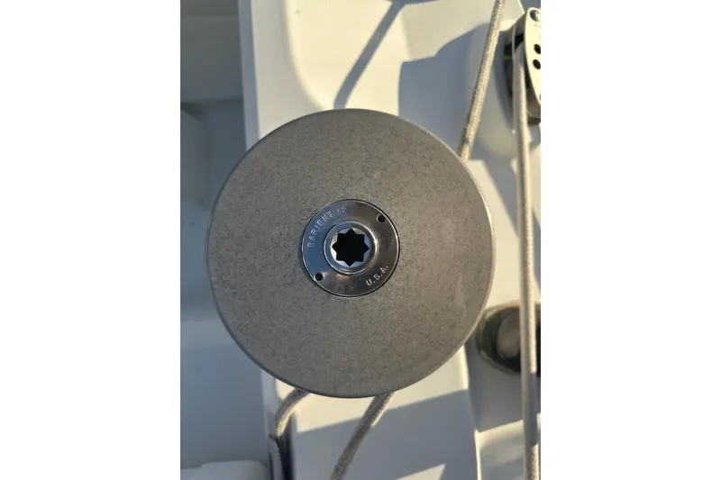 Slide: The Image of Winch on 1984 C&C 41 sailboat deck, featuring Barient 12 model. - 8