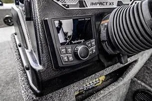 Slide: The Image of 2026 Lund 1875 Impact XS SS boat interior with gray seating and deck. - 9