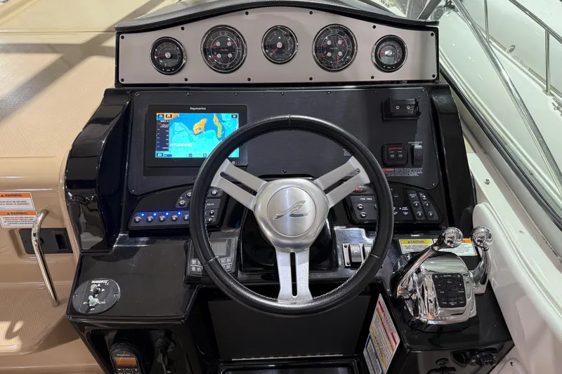 Slide: The Image of Raymarine navigation display on 2017 Sea Ray Sundancer 330 boat dashboard. - 35