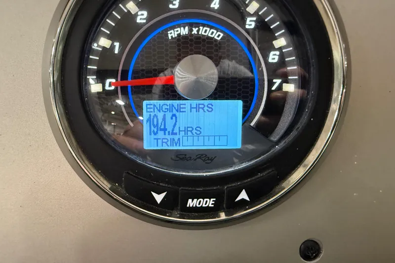 Slide: The Image of Control panel of a 2017 Sea Ray Sundancer 330 boat with chrome throttle levers. - 37