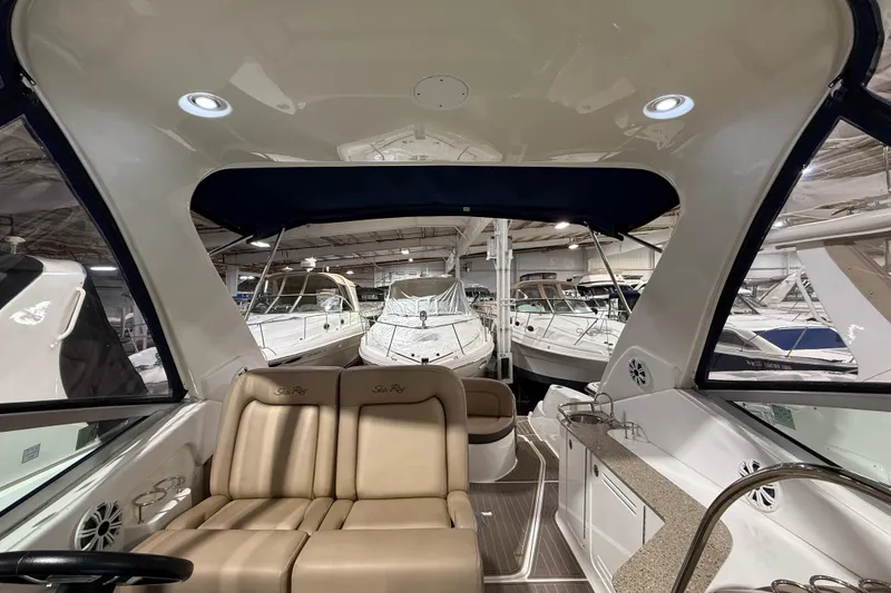 Slide: The Image of Luxurious interior of 2017 Sea Ray Sundancer 330 yacht with wood paneling and seating. - 43